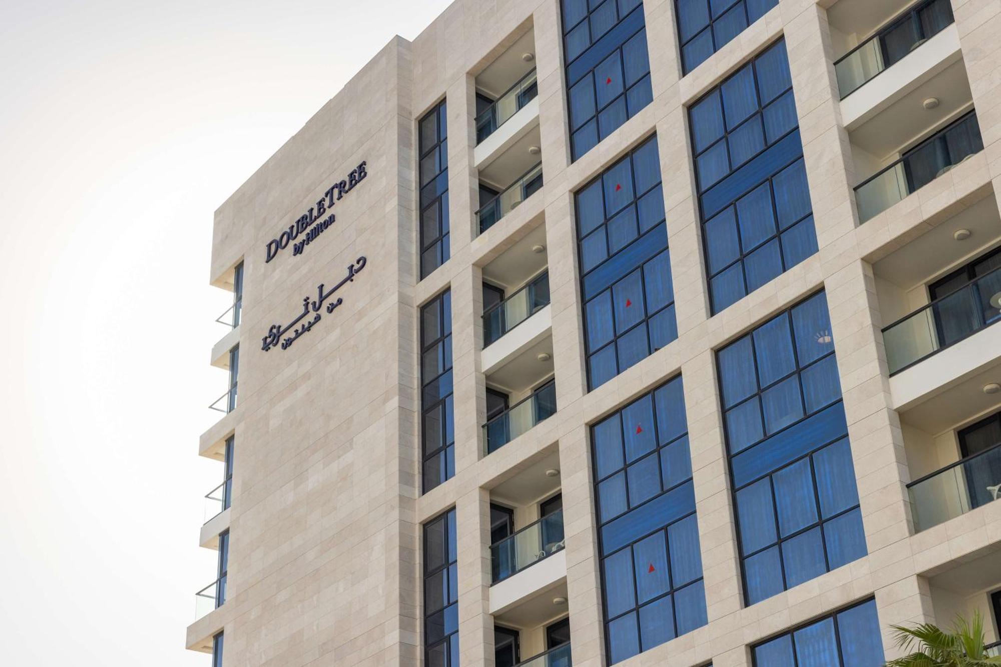 Hotel Doubletree By Hilton Doha Downtown Extérieur photo Dubai Police Academy